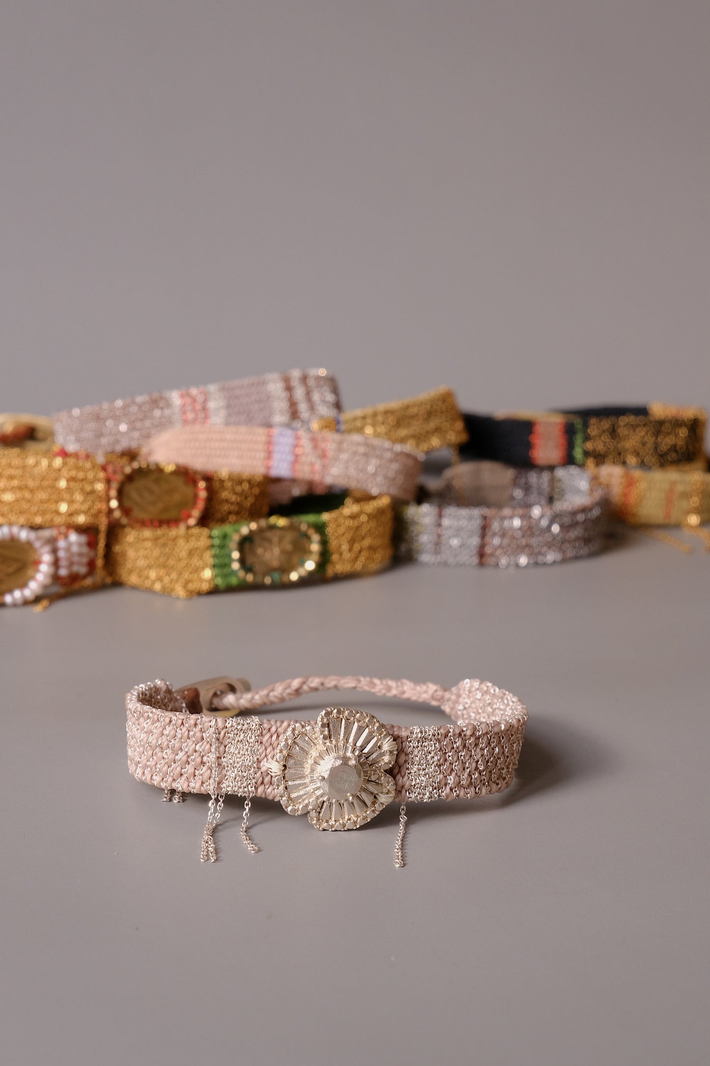 Collectors of contemporary textile jewelry, bohemian luxury lovers, and fans of slow fashion.