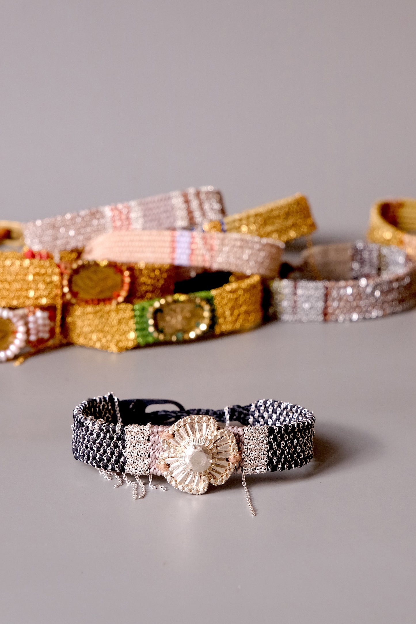 LOOM WOVEN BRACELET WITH FLOWER CHARM   #001