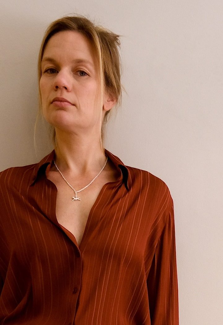 silver hand crochet necklae with Foal pendant Barcelona jewelry. Katia Alpha jewelry